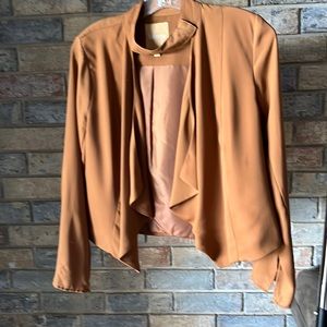 Caramel colored polyesterjacket, size Small,